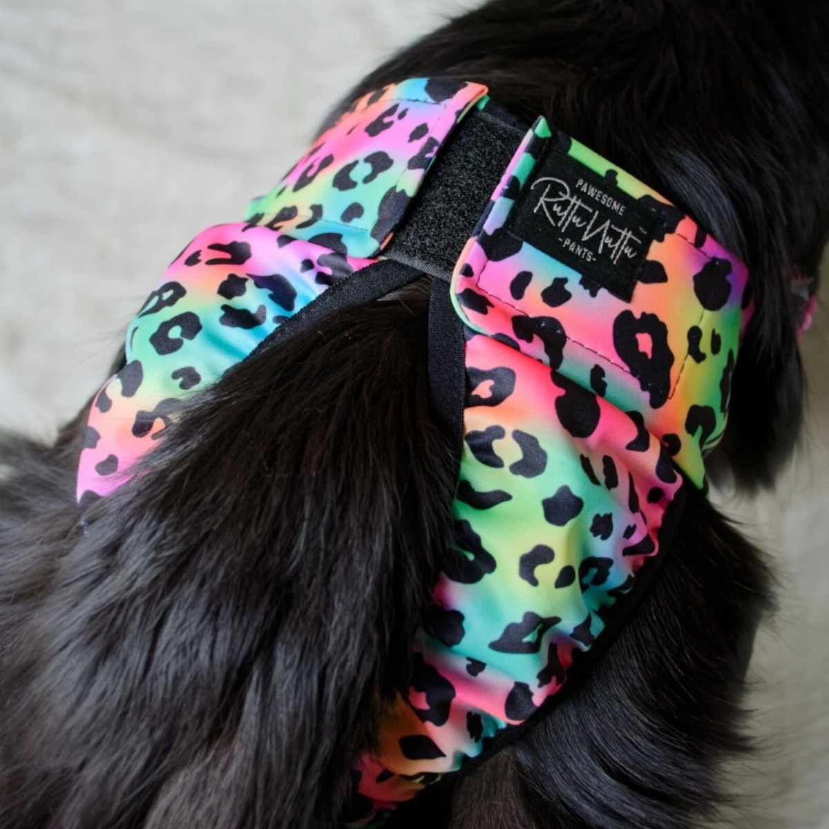 RuttuNuttu juoksupöksyt kietaisumalli, sateenkaari leo